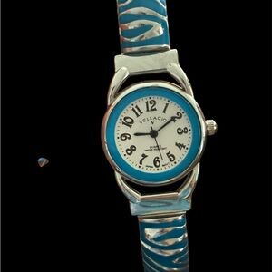 Women's Blue and Silver Watch